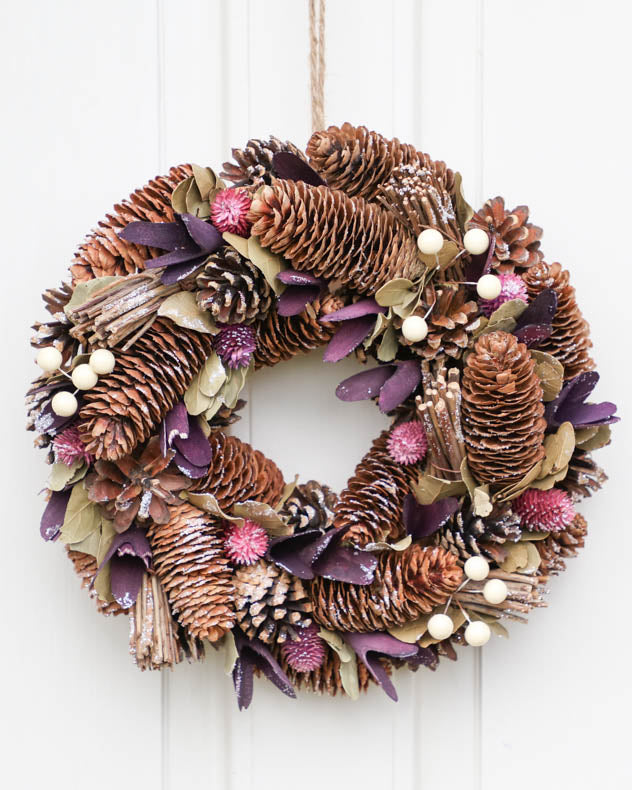 purple pinecone door wreath