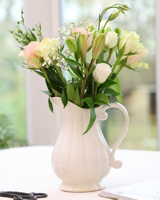white fluted vase