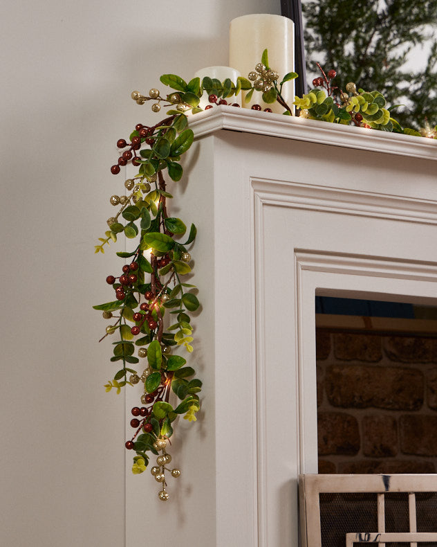 light up christmas garland on mantle