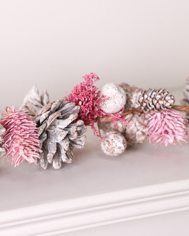 pink and white garland on centrepiece