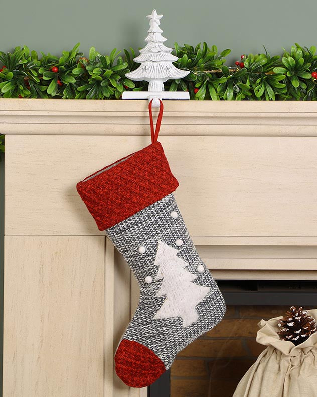 Traditional Christmas stocking hanging on the mantle