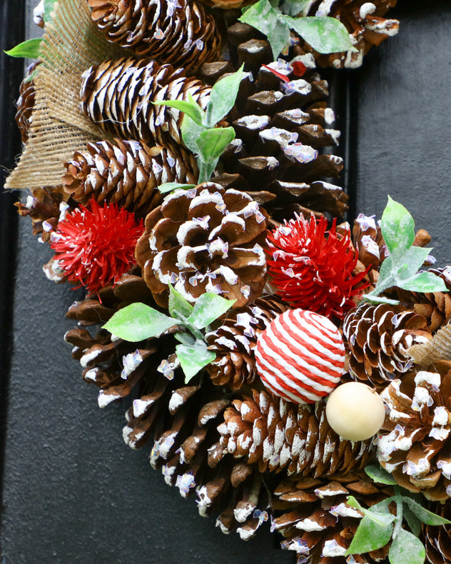 pinecone snow front door wreath