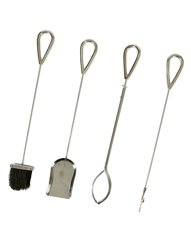 poker, tongs, shovel and brush fireside