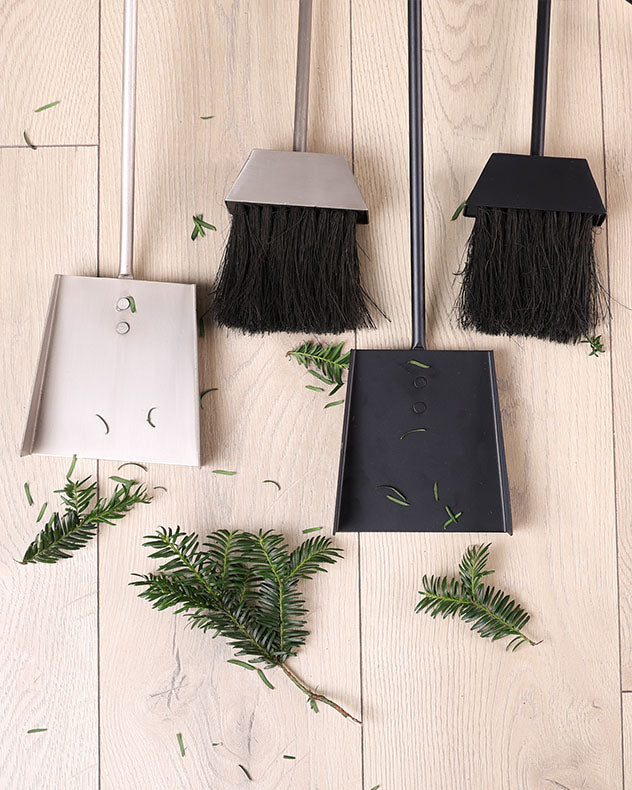 pewter finish and black fire shovel and brush