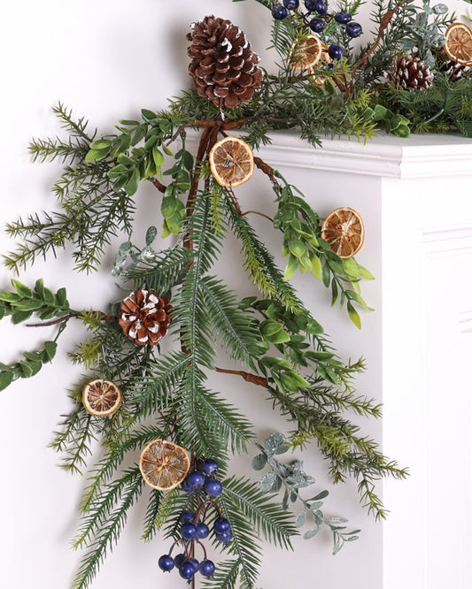 winter fruits garland on mantle