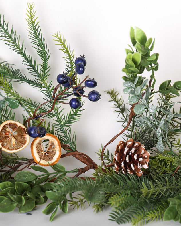 christmas fruits garland on mantle