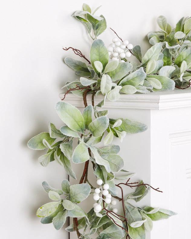 white berry lambs ear christmas garland on mantle