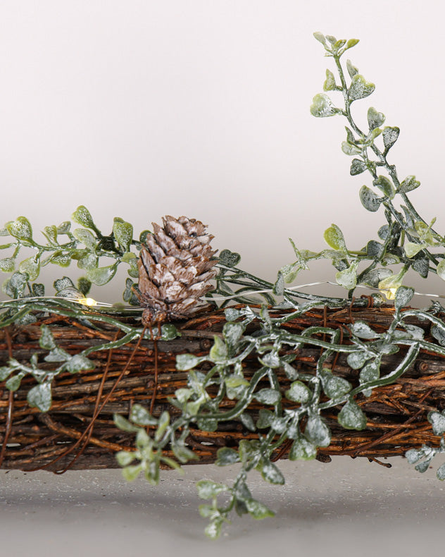 christmas branch decoration on mantle
