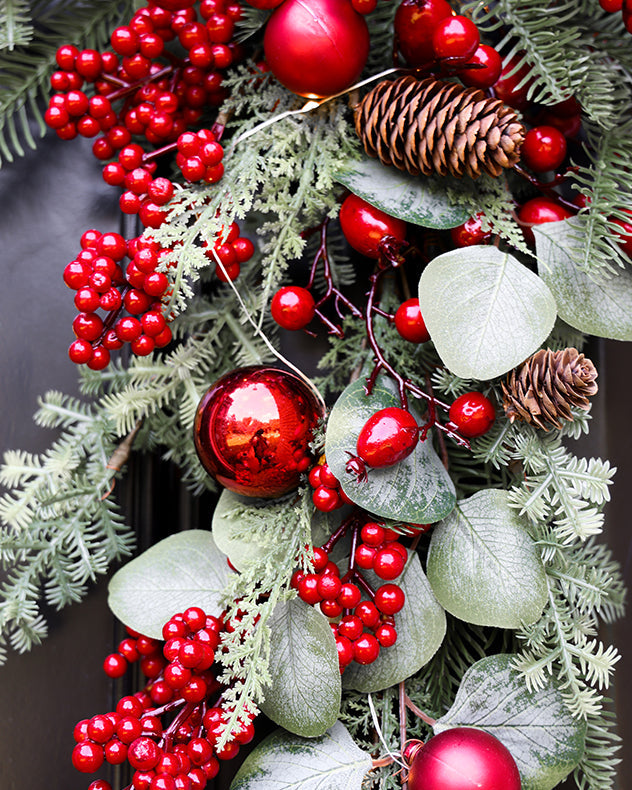 red berry and pinecone christmas swag