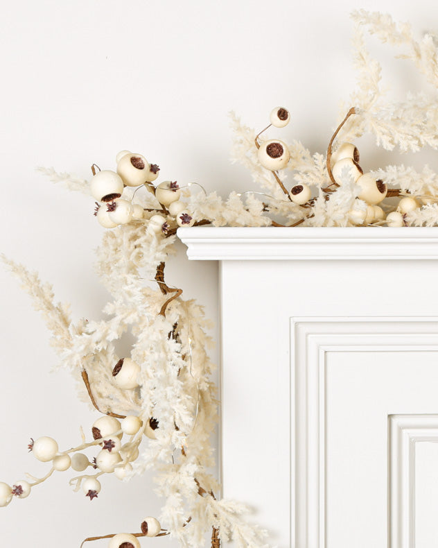 pampas grass white christmas garland on mantle