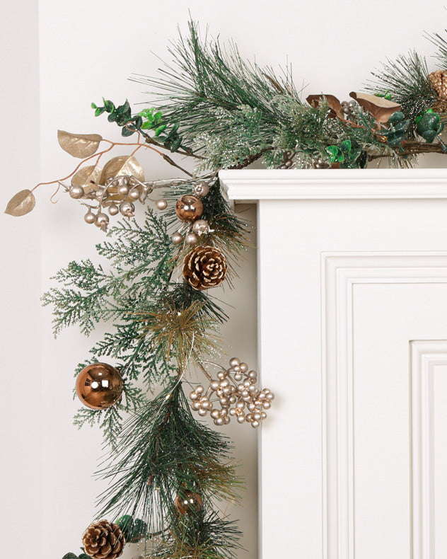 Green and Gold Garland on Mantle