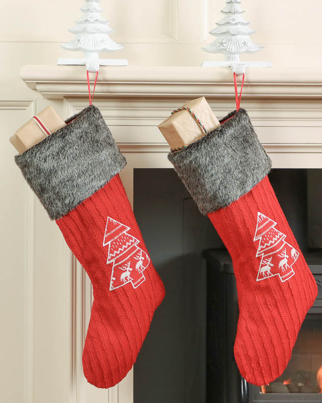 red christmas tree stocking hanging on the mantle