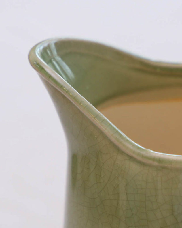 green ceramic flower vase