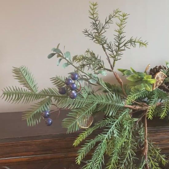christmas garland winter fruits and pinecone