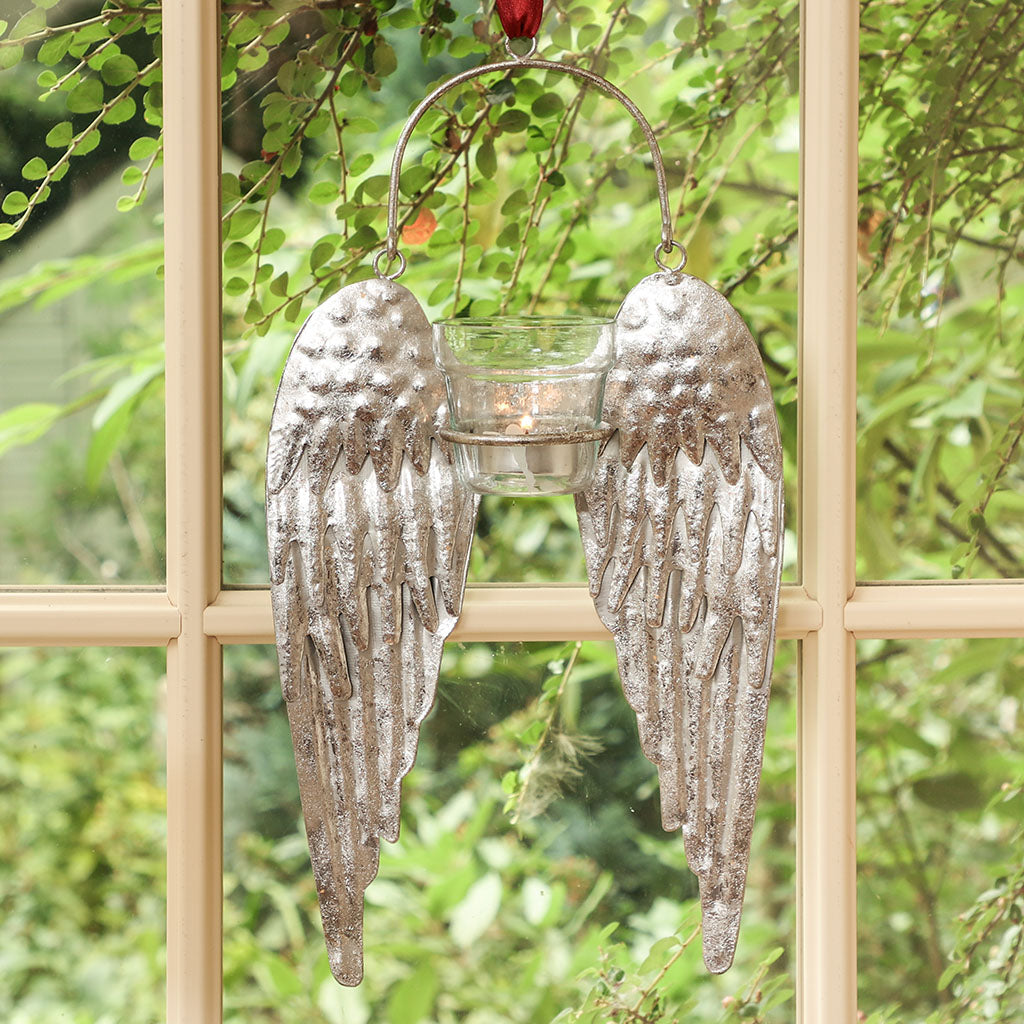 Silver wall mounted candle holder