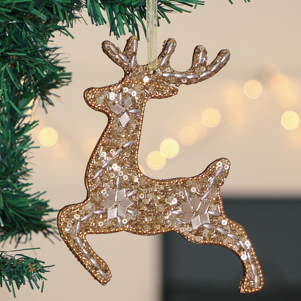 Gold reindeer hanging tree decoration